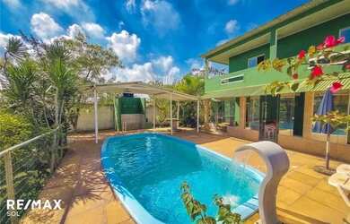 Imagem: A casa possui 5 Dormitórios, 5 Banheiros, 5 Vagas na garagem