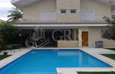 Imagem: A casa em condomínio possui 5 Dormitórios, 5 Banheiros, 5