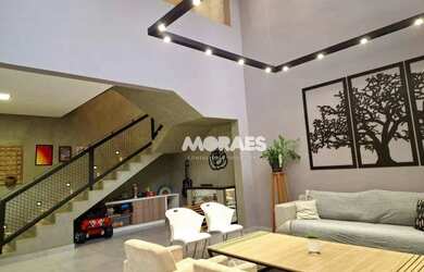 Imagem: A casae possui 3 Dormitórios, 3 Banheiros, 5 Vagas na garagem