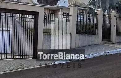 Imagem: A casa possui 3 Dormitórios, 5 Banheiros, 5 Vagas na garagem