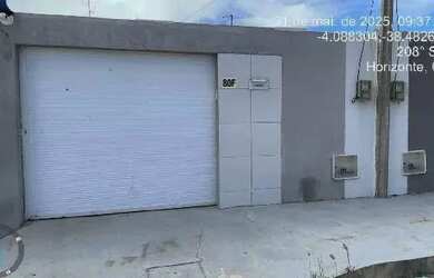 Imagem: A casa possui 2 Dormitórios, 1 Banheiro, 1 Vaga na garagem