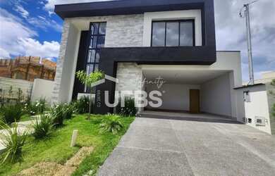 Imagem: A casa possui 4 Dormitórios, 5 Banheiros, 4 Vagas na garagem