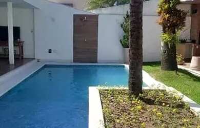 Imagem: A casa em condomínio possui 5 Dormitórios, 5 Banheiros, 3