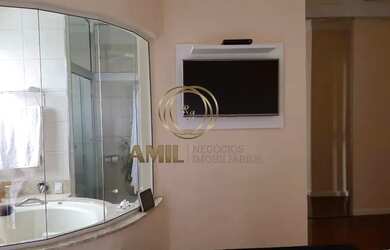 Imagem: A casa possui 4 Dormitórios, 5 Banheiros, 2 Vagas na garagem