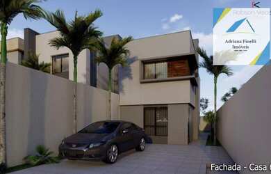 Imagem: A casa possui 3 Dormitórios, 3 Banheiros, 2 Vagas na garagem