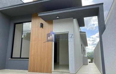 Imagem: A casa possui 3 Dormitórios, 3 Banheiros, 2 Vagas na garagem