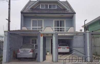 Imagem: A casa possui 5 Dormitórios, 4 Banheiros, 3 Vagas na garagem