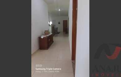 Imagem: A casa possui 3 Dormitórios, 3 Banheiros, 4 Vagas na garagem