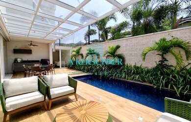 Imagem: A casa em condomínio possui 5 Dormitórios, 5 Banheiros, 2