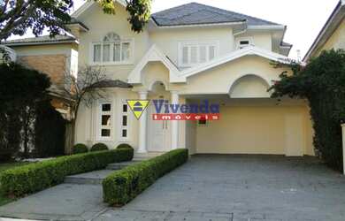 Imagem: A casa possui 3 Dormitórios, 4 Banheiros, 2 Vagas na garagem