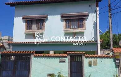 Imagem: A casa possui 4 Dormitórios, 2 Banheiros, 1 Vaga na garagem