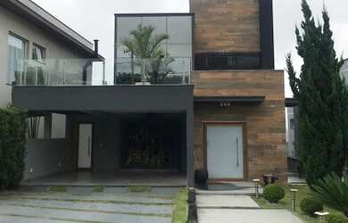 Imagem: A casa em condomínio possui 5 Dormitórios, 5 Banheiros, 4