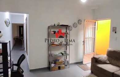 Imagem: A casa possui 2 Dormitórios, 3 Banheiros, 2 Vagas na garagem