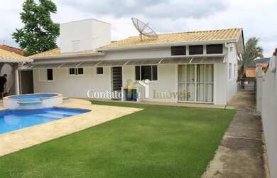 Imagem: A casa em condomínio possui 3 Dormitórios, 4 Banheiros, 3