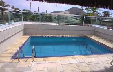 Imagem: A casa possui 4 Dormitórios, 4 Banheiros, 4 Vagas na garagem