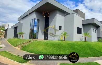 Imagem: A casa possui 3 Dormitórios, 5 Banheiros, 4 Vagas na garagem