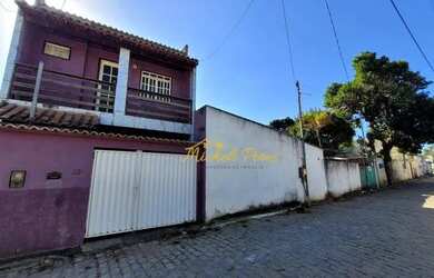 Imagem: A casa possui 3 Dormitórios, 1 Banheiro, 1 Vaga na garagem