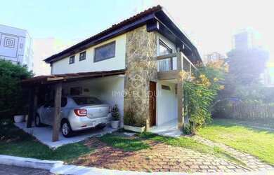 Imagem: A casa em condomínio possui 5 Dormitórios, 5 Banheiros, 3