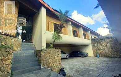 Imagem: A casa possui 5 Dormitórios, 5 Banheiros, 5 Vagas na garagem