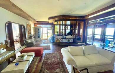 Imagem: A casa em condomínio possui 4 Dormitórios, 4 Banheiros, 1.000m²