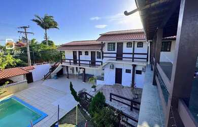 Imagem: A casa possui 5 Dormitórios, 2 Banheiros, 2 Vagas na garagem