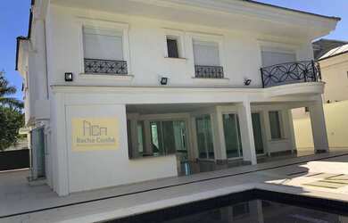 Imagem: A casa em condomínio possui 5 Dormitórios, 5 Banheiros, 4