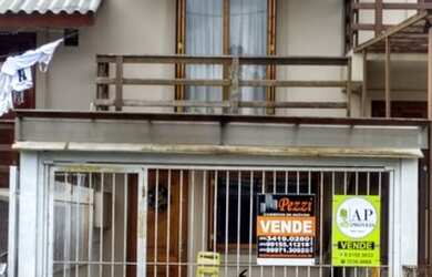 Imagem: A casa possui 2 Dormitórios, 1 Banheiro, 1 Vaga na garagem