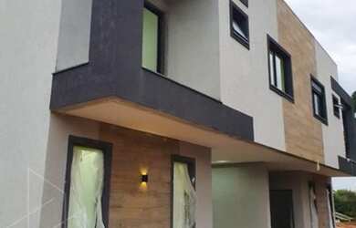 Imagem: A casa possui 3 Dormitórios, 3 Banheiros, 1 Vaga na garagem