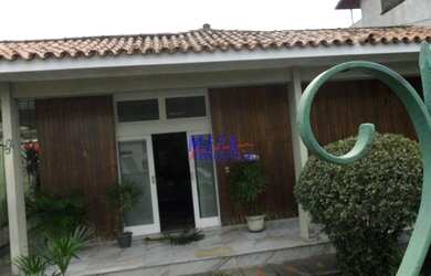 Imagem: A casa possui 3 Dormitórios, 3 Banheiros, 3 Vagas na garagem