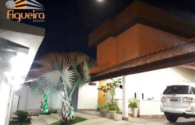 Imagem: A casa possui 4 Dormitórios, 2 Banheiros, 700m² de Área e