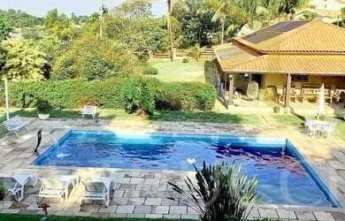 Imagem: A casa em condomínio à venda possui 5 Dormitórios, 5 Banheiros