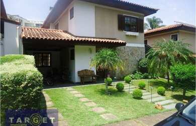 Imagem: A casa em condomínio possui 4 Dormitórios, 4 Banheiros, 2