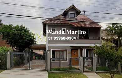 Imagem: A casa em condomínio possui 4 Dormitórios, 4 Banheiros, 2