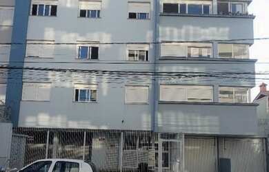 Imagem: O apartamento possui 3 Dormitórios, 1 Banheiro, 2 Vagas na