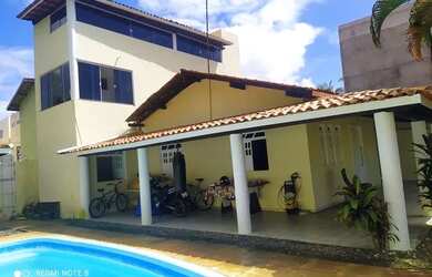 Imagem: A casa possui 4 Dormitórios, 5 Banheiros, 5 Vagas na garagem