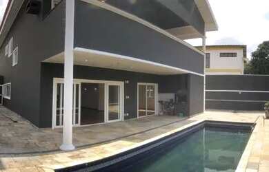 Imagem: A casa em condomínio possui 4 Dormitórios, 5 Banheiros, 2