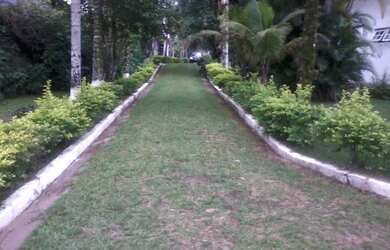 Imagem: A casa possui 4 Dormitórios, 3 Banheiros, 5 Vagas na garagem