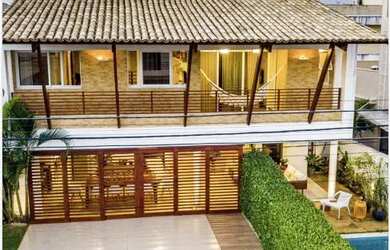 Imagem: A casa possui 3 Dormitórios, 1 Banheiro, 3 Vagas na garagem