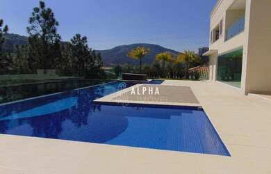 Imagem: A casa em condomínio possui 5 Dormitórios, 5 Banheiros, 5