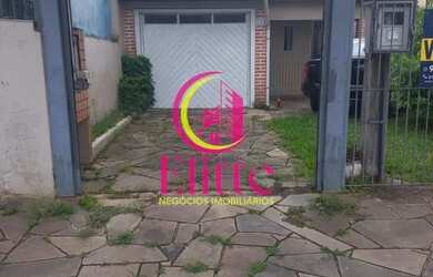 Imagem: A casa possui 2 Dormitórios, 2 Banheiros, 1 Vaga na garagem