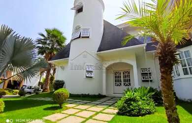 Imagem: A casa em condomínio possui 5 Dormitórios, 5 Banheiros, 5