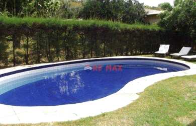 Imagem: A casa em condomínio possui 4 Dormitórios, 4 Banheiros, 1