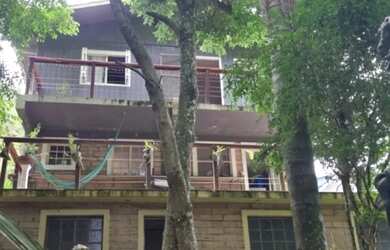 Imagem: A casa possui 3 Dormitórios, 3 Banheiros, 3 Vagas na garagem