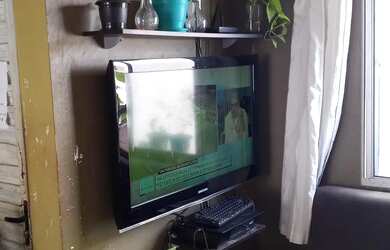 Imagem: O apartamento possui 2 Dormitórios, 1 Banheiro, 1 Vaga na garagem