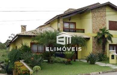 Imagem: A casa em condomínio possui 5 Dormitórios, 5 Banheiros, 5