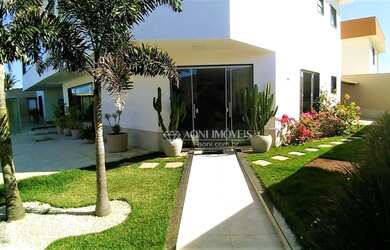 Imagem: A casa possui 4 Dormitórios, 5 Banheiros, 5 Vagas na garagem