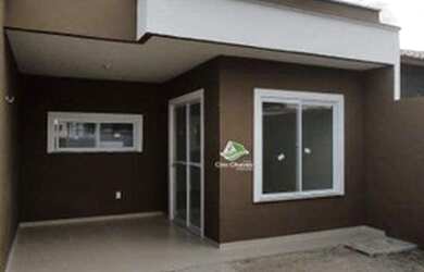 Imagem: A casa possui 3 Dormitórios, 2 Banheiros, 2 Vagas na garagem