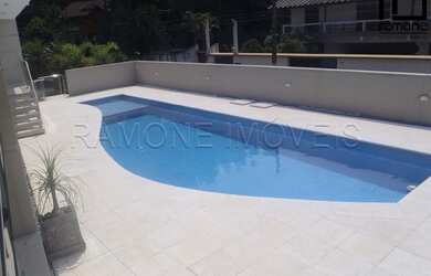 Imagem: A casa possui 4 Dormitórios, 5 Banheiros, 5 Vagas na garagem