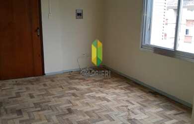 Imagem: O apartamento possui 1 Dormitório, 1 Banheiro, 1 Vaga na garagem