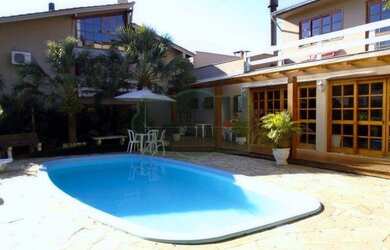 Imagem: A casa em condomínio possui 3 Dormitórios, 3 Banheiros, 3